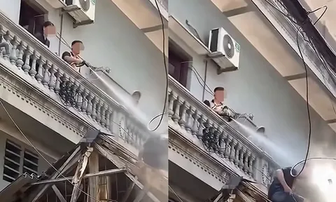 Công an vào cuộc xác minh người đàn ông xịt nước vào thợ đang tháo dỡ công trình