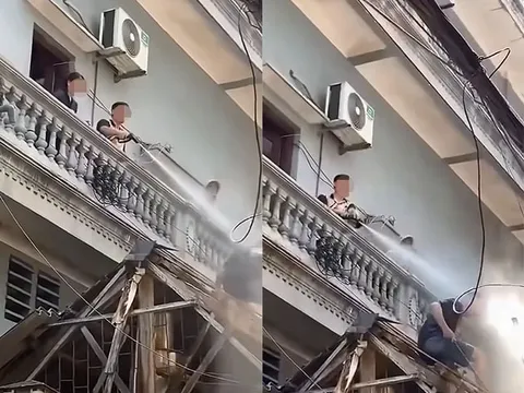 Công an vào cuộc xác minh người đàn ông xịt nước vào thợ đang tháo dỡ công trình